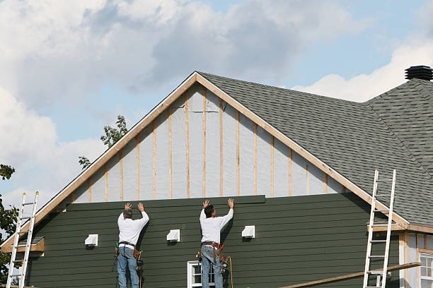 Professional Siding Replacement technician working in Prince George, VA